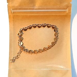 NWOT Elegant Gold Heart Bracelet.